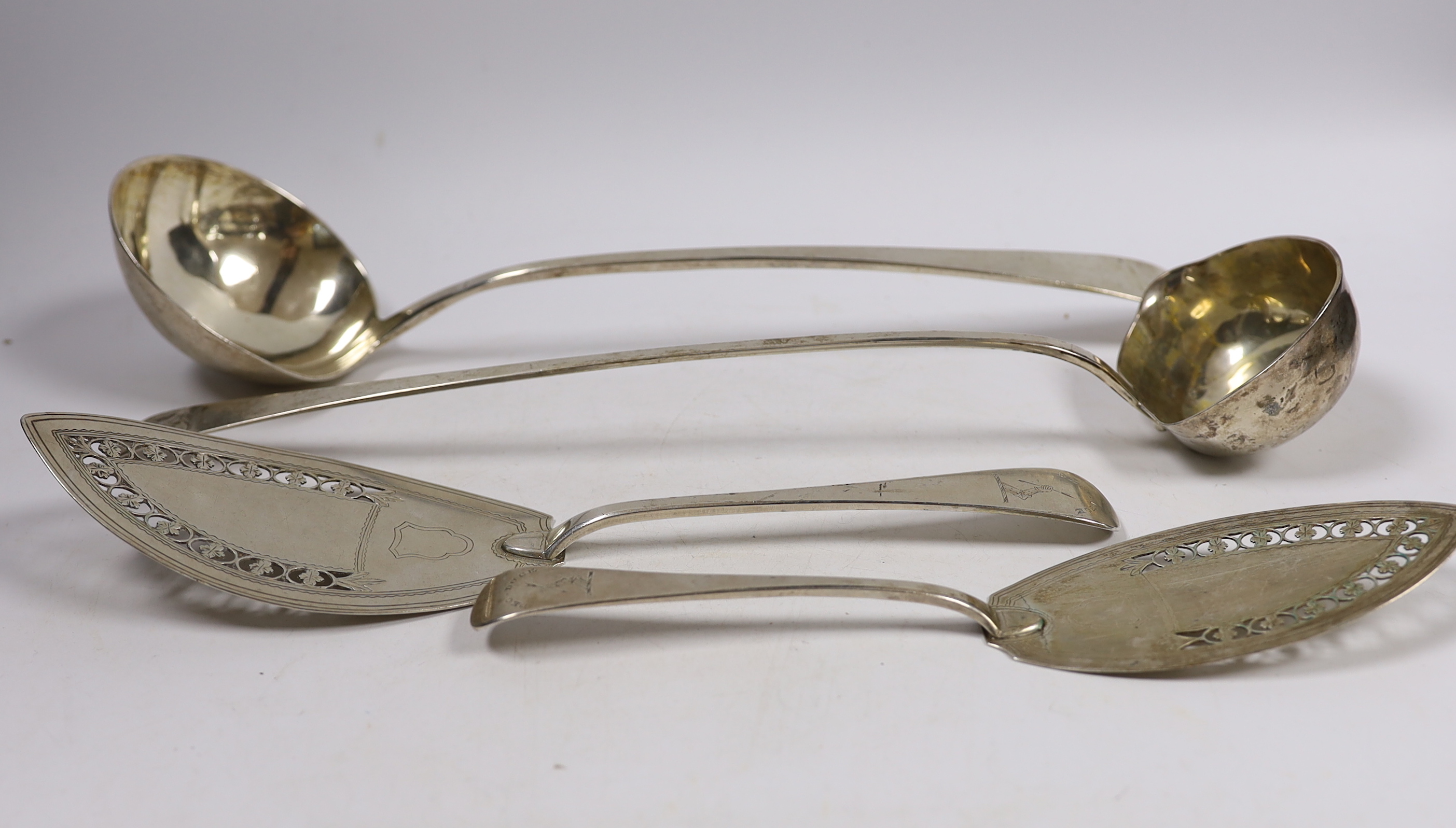 Two Scandinavian white metal soup ladles, longest 37.7cm and two fish slices, by Schmid, 19oz.